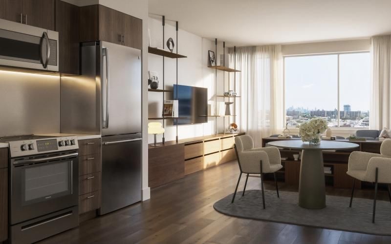a kitchen with a table and chairs