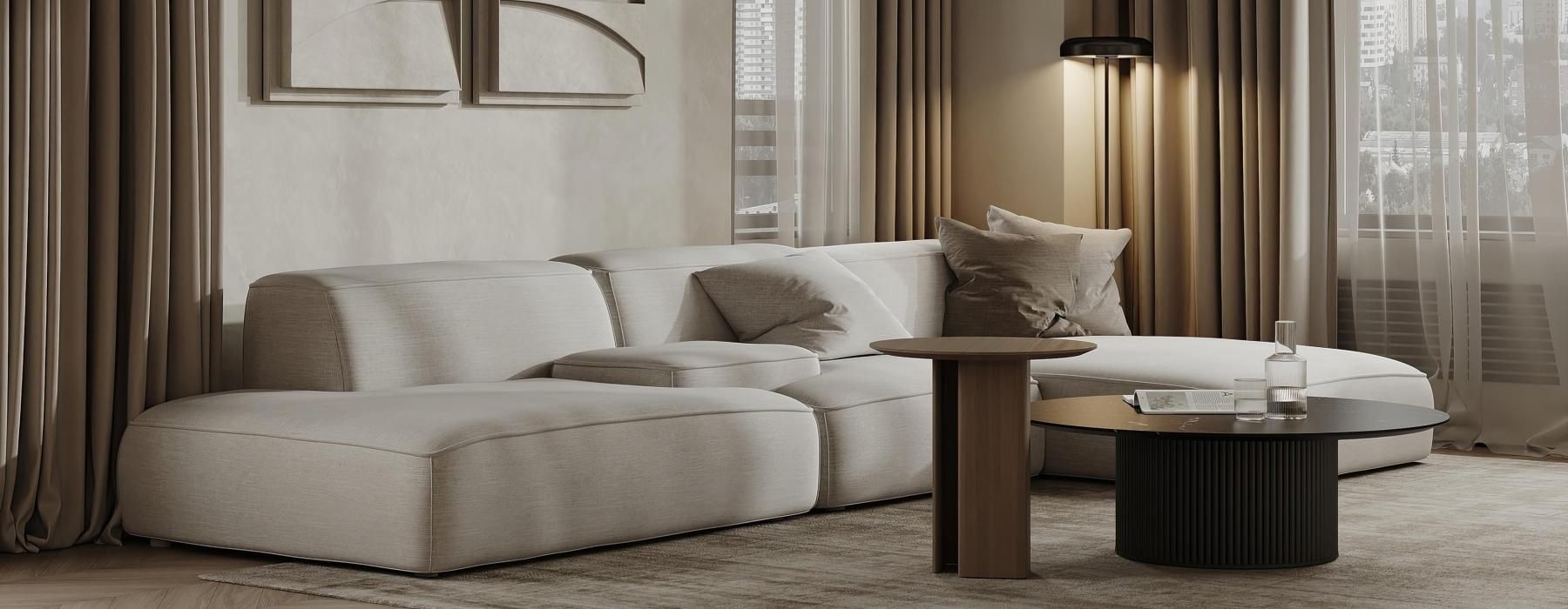 a modern living room with a couch and warm lighting