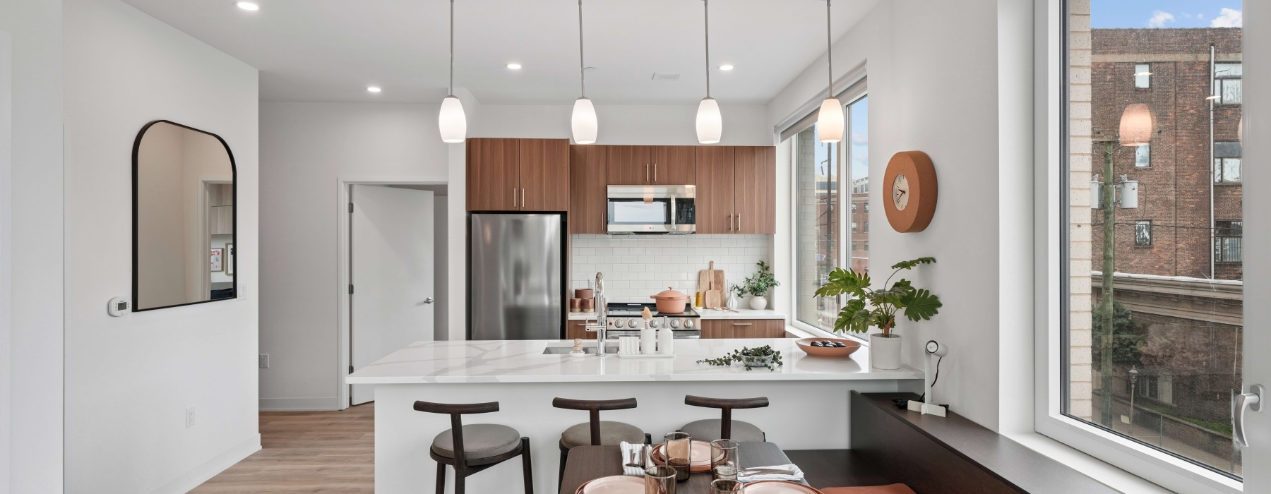 a kitchen with white cabinets
